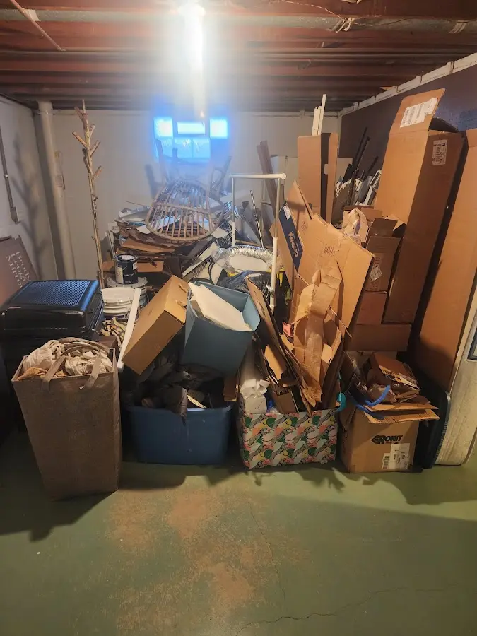 Roll-off dumpster container at job site for 4 Yard Dumpster Rental in Greenfield